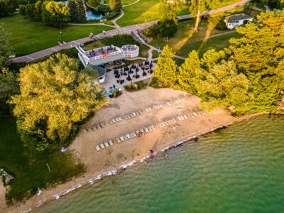 Lake Deck at The Osthoff Resort overlooking the water with outdoor seating for guests.