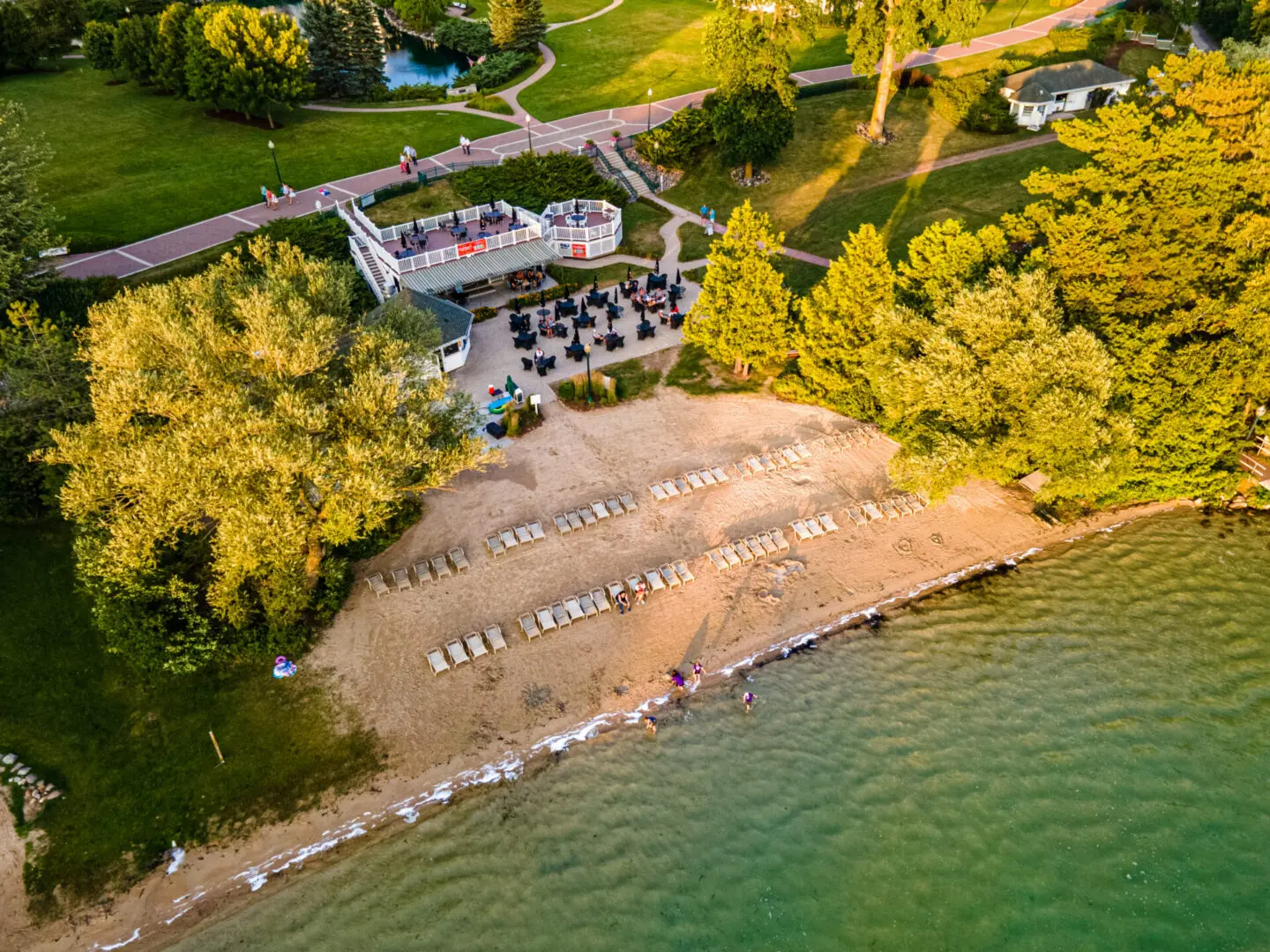 Lake Deck at The Osthoff Resort overlooking the water with outdoor seating for guests.