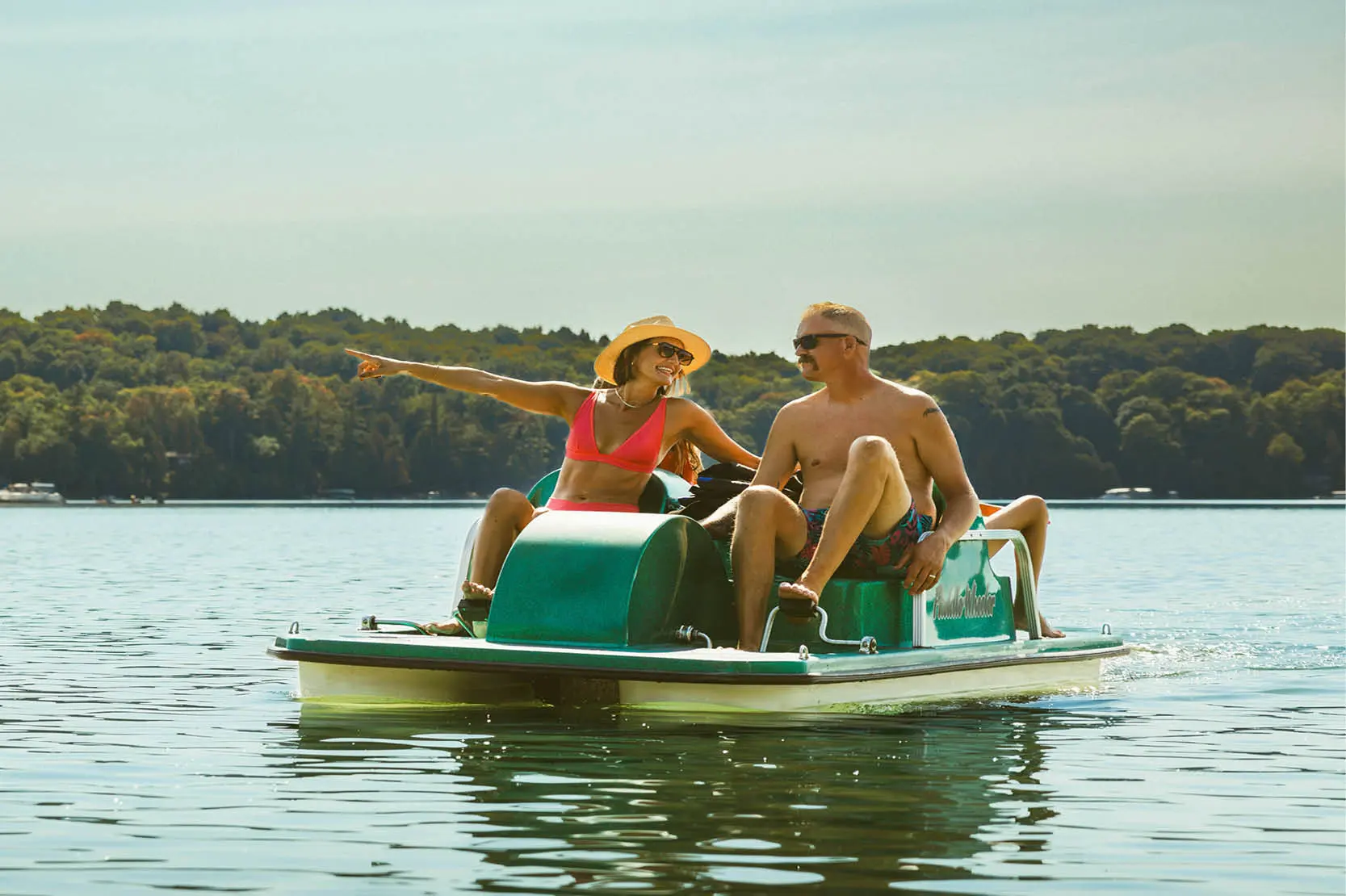 Four‑person paddleboat rental at The Osthoff Resort & Spa
