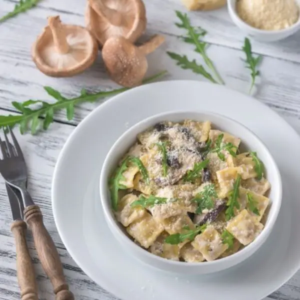 Guests prepare fresh pasta dishes including salmon and asparagus linguine and mushroom ravioli with sage brown butter.