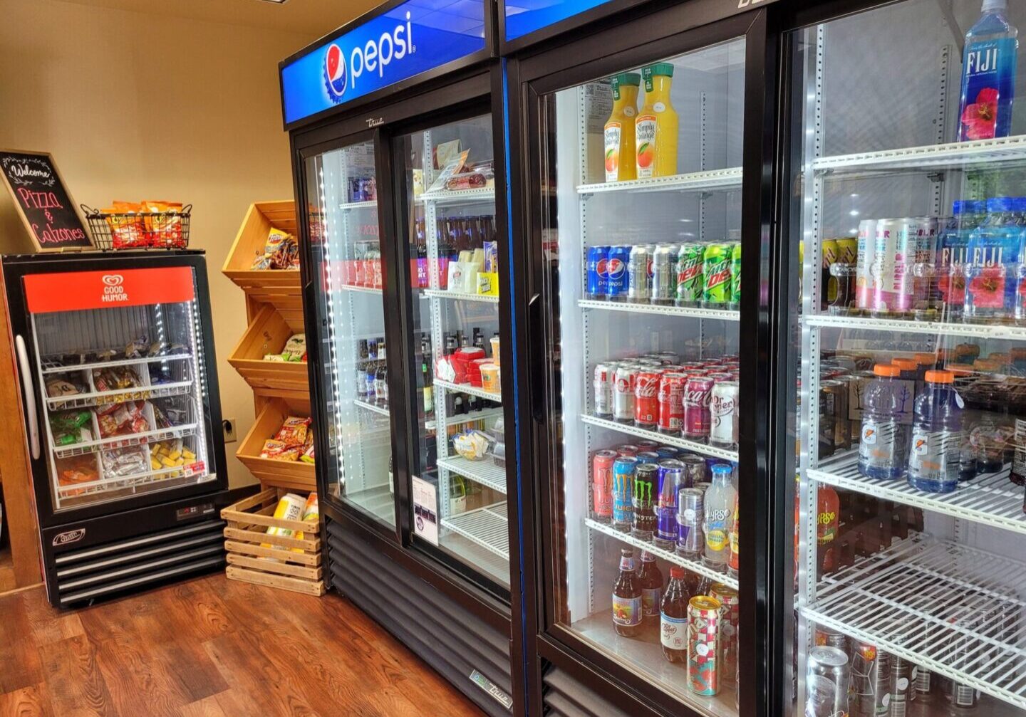 Shop local gifts, apparel, and resort keepsakes at The Elk Trader Osthoff Resort merchandise and souvenirs displayed in The Elk Trader gift shop and mini market.