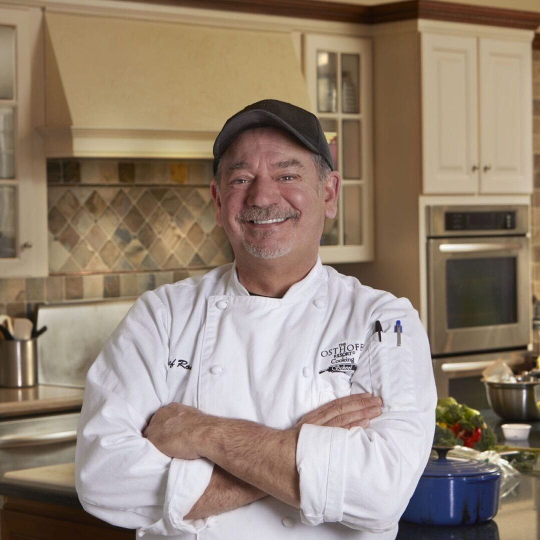 Chef Rodney Schulz, head instructor at The Osthoff Resort Cooking School, leading a hands-on culinary class.