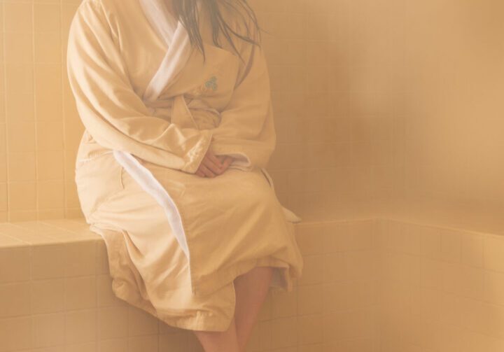 Guest relaxing in the soothing Hammam Steam room at Aspira Spa, The Osthoff Resort.