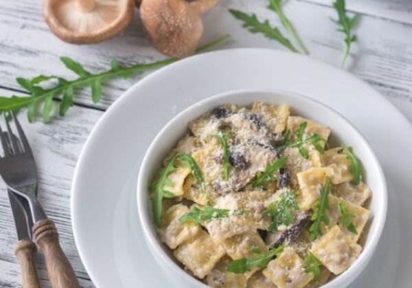 Guests prepare fresh pasta dishes including salmon and asparagus linguine and mushroom ravioli with sage brown butter.