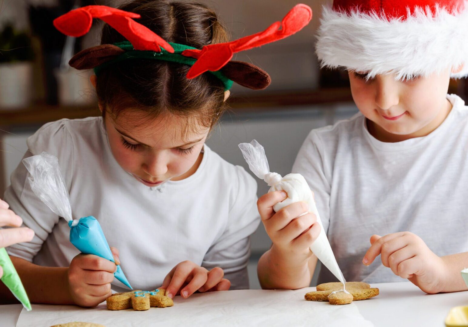 Holiday cookie decorating workshop at The Osthoff Resort with family‑friendly designs, frosting, snacks, and a cozy drop‑in experience
