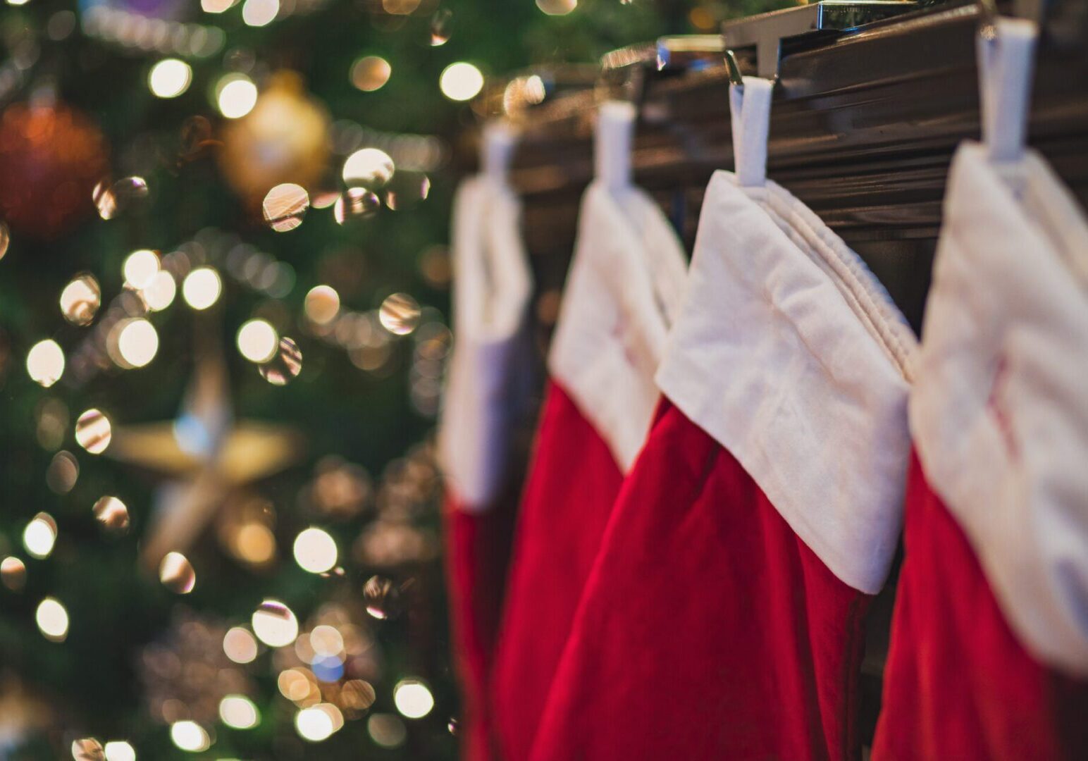 Family-friendly holiday crafting workshop at The Osthoff Resort with ornament decorating, felt stocking crafts, snacks, and a cozy drop‑in experience