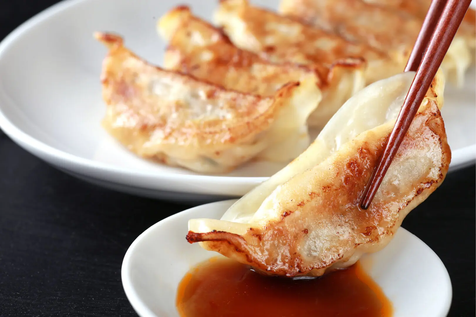 Asian cooking class at The Osthoff Resort featuring pot stickers, egg rolls, and lettuce wraps.
