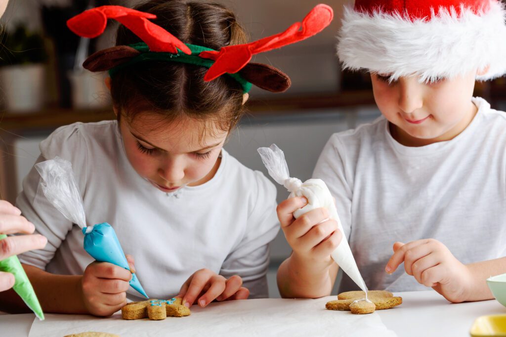Holiday cookie decorating workshop at The Osthoff Resort with family‑friendly designs, frosting, snacks, and a cozy drop‑in experience