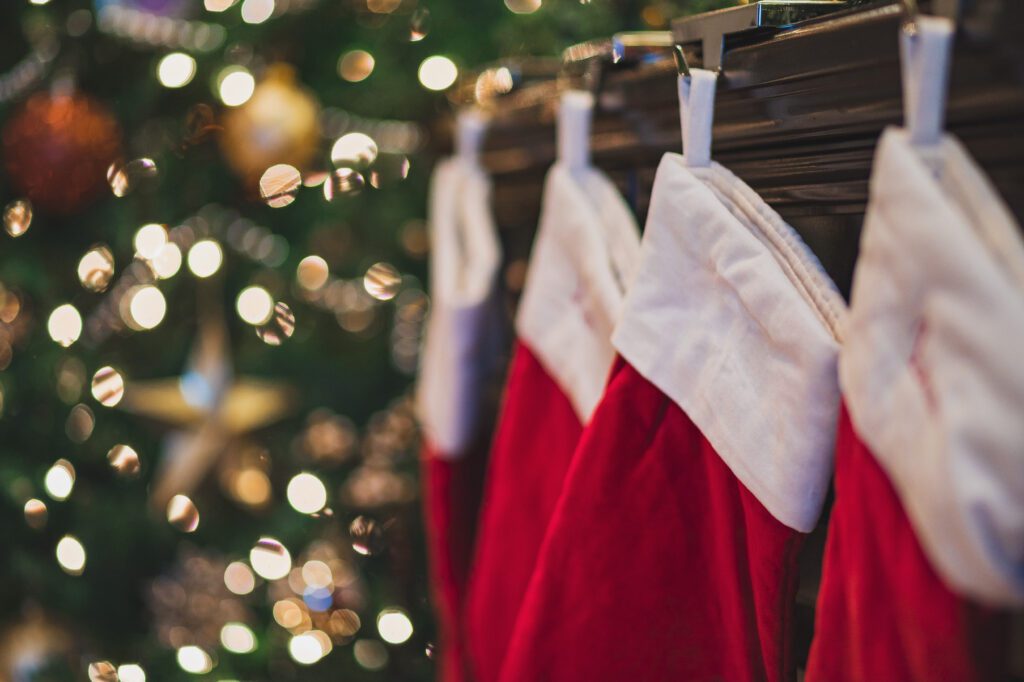 Family-friendly holiday crafting workshop at The Osthoff Resort with ornament decorating, felt stocking crafts, snacks, and a cozy drop‑in experience